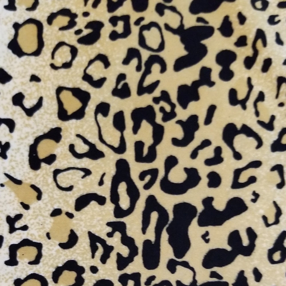 Essentials by Milano leopard print top. - Picture 2 of 4